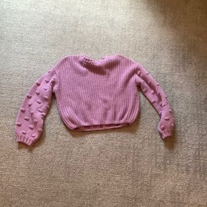 purple knit sweater with puffed sleeves